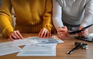 Canadian couple preparing for departure tax before moving abroad.